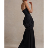 Elegant black strapless corset maxi dress with dramatic draped silhouette and fitted bodice — Club L London | Endless UAE