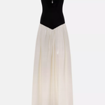Woman wearing black and white off-shoulder Parisienne Maxi Dress in ornate palace room — Lichi | Endless UAE