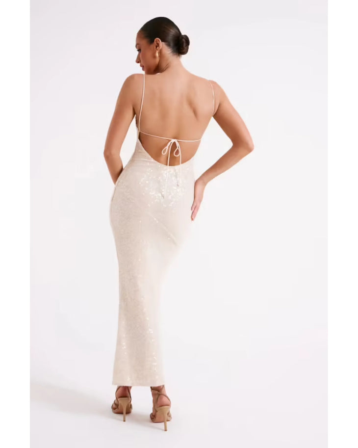 Woman wearing cream sequin maxi dress with thin straps and ankle length — Meshki | Endless UAE