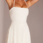 White halter A-line mini dress with embellished detail on model wearing metallic sandals — Oh Polly | Endless UAE