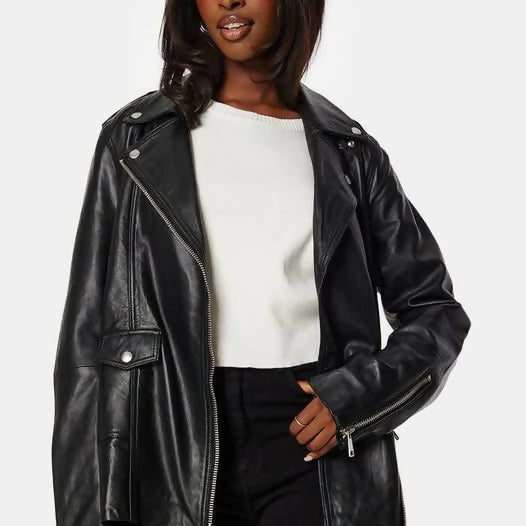 Black oversized leather biker jacket with silver zippers and snap buttons worn over white top — Selected Femme | Endless UAE