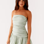 Sage green strapless bubble mini dress with ruched detailing and scalloped hem — Peppermayo | Endless UAE