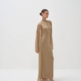 Gold shimmer maxi dress with mock neck and dramatic cape sleeves, worn with strappy heels — Nora The Label | Endless UAE