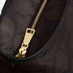 Black leather tote bag with dual handles and Coach branding — Coach | Endless UAE