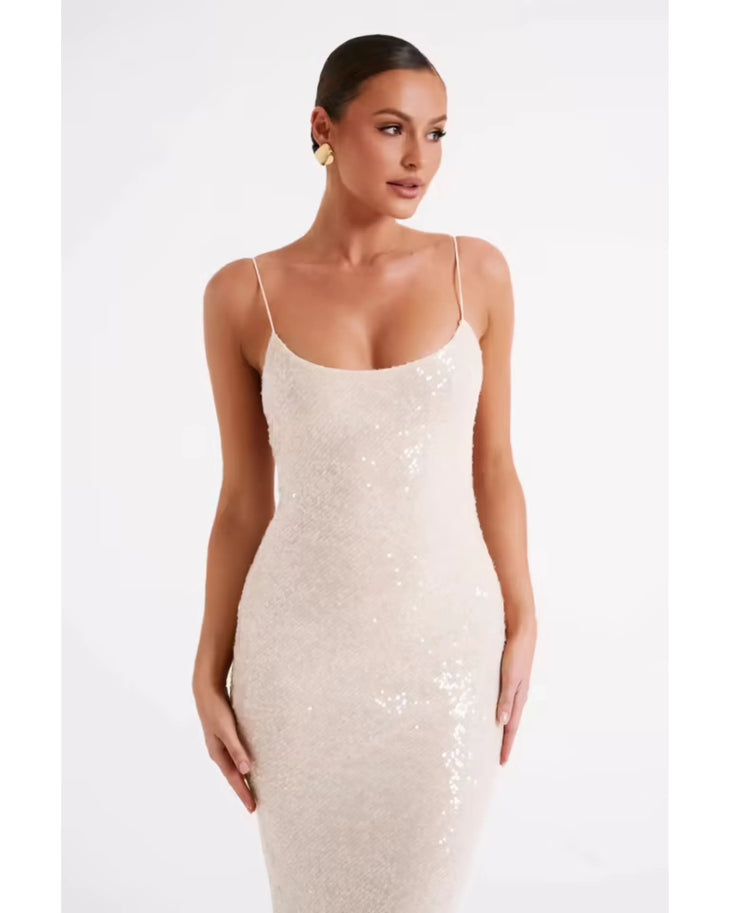Woman wearing cream sequin maxi dress with thin straps and ankle length — Meshki | Endless UAE