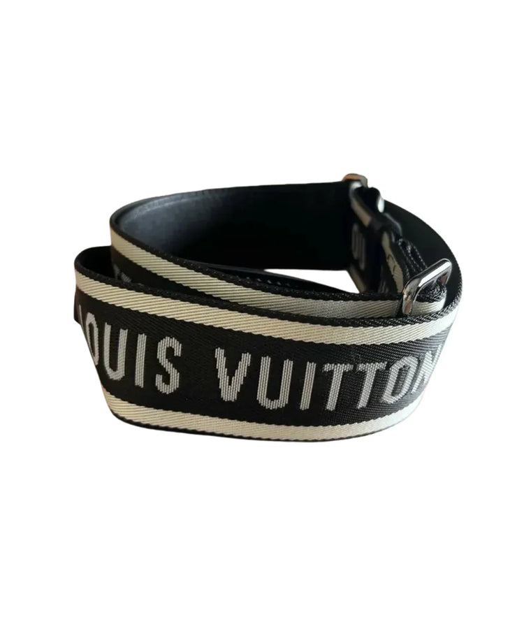 Louis Vuitton branded adjustable shoulder strap in black and beige with logo text and leather accents — Louis Vuitton | Endless UAE