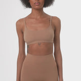 Beige booty boosting shorts with enhanced contouring design — Underhance | Endless UAE