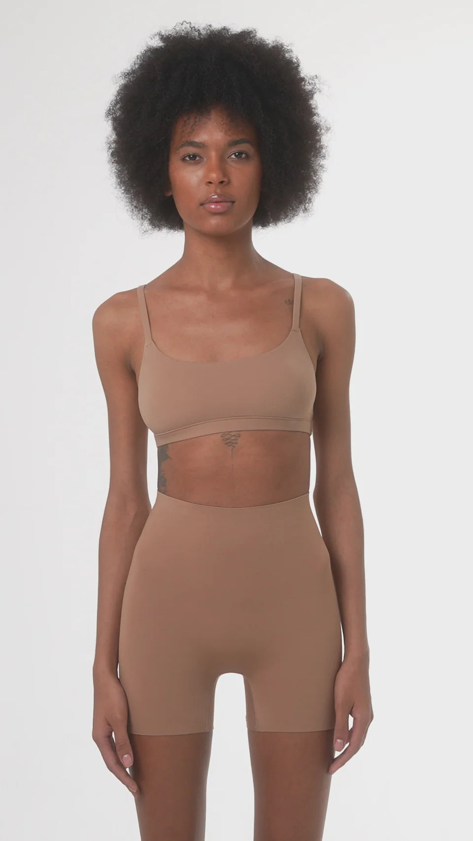 Beige booty boosting shorts with enhanced contouring design — Underhance | Endless UAE