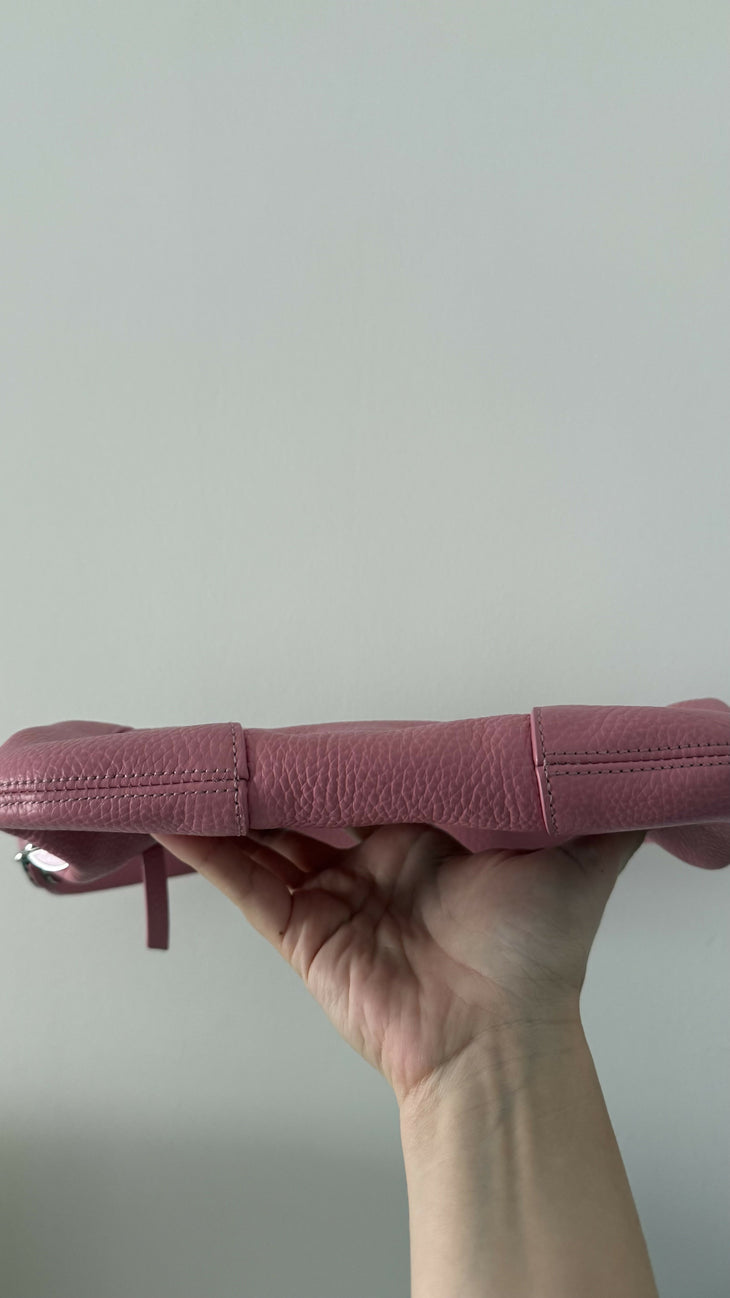 Pink leather mini shoulder bag with dual handles displayed against neutral background — By Far | Endless UAE