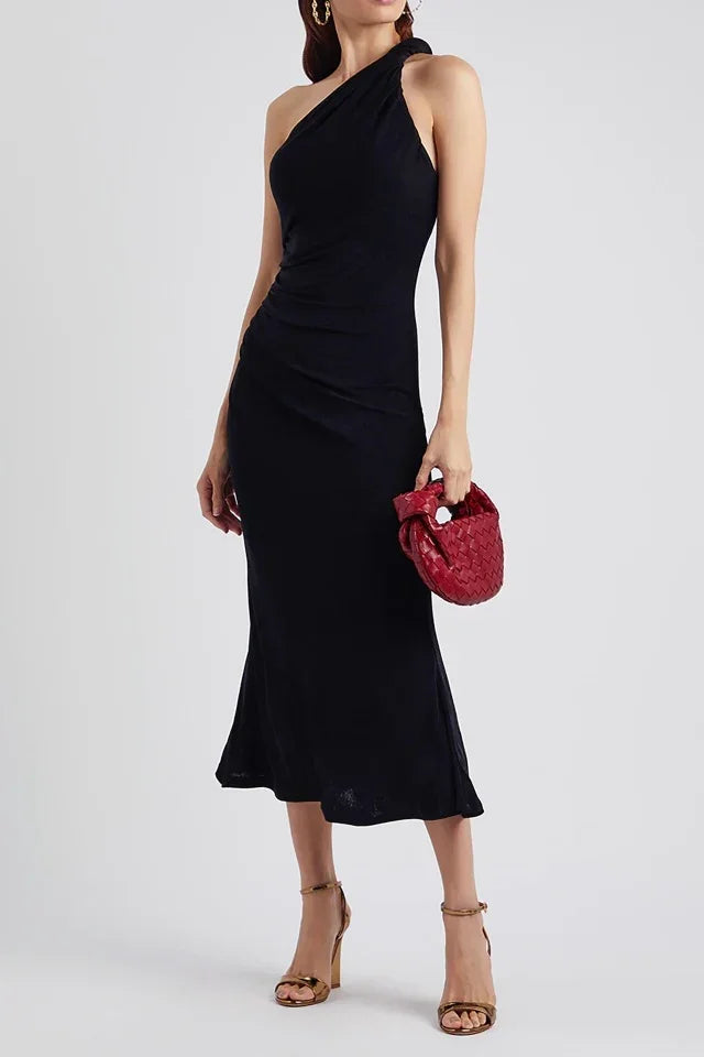 Black one-shoulder velvet midi dress with red quilted bag and gold heeled sandals — Misha | Endless UAE