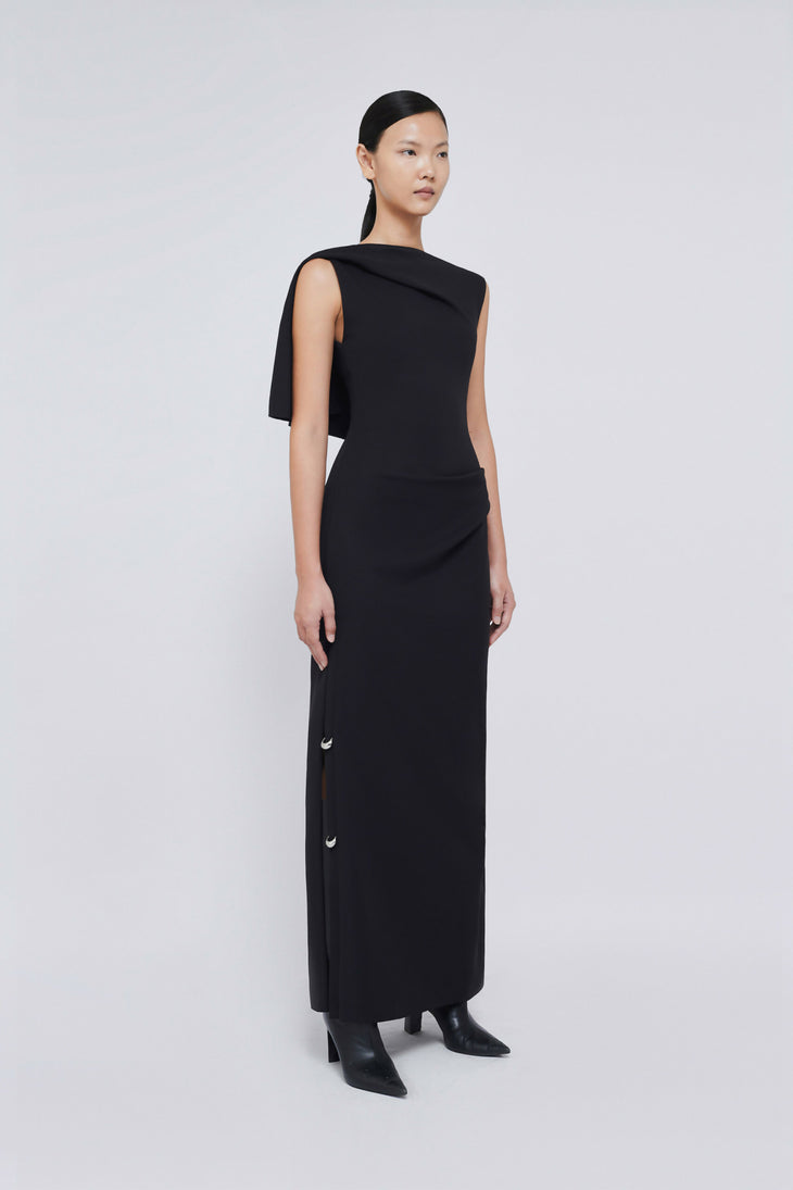 Black sleeveless maxi dress with draped shoulder detail and side buttons — Chats By C.Dam | Endless UAE