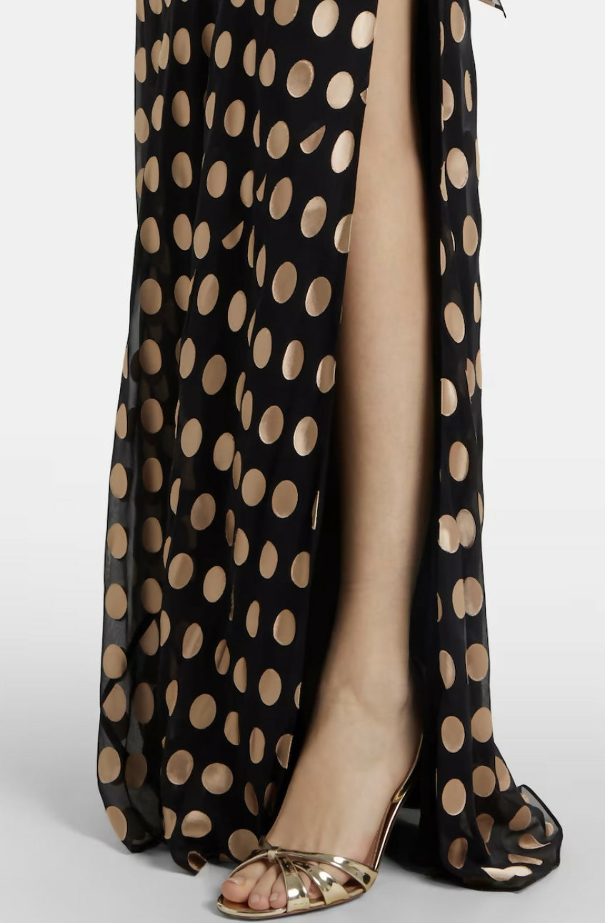 Black polka-dot maxi dress with one-shoulder design and flowing silhouette paired with gold metallic sandals — Alexandra Miro | Endless UAE