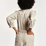 Beige denim jumpsuit with puffed sleeves and belt — Essentiel Antwerp | Endless UAE