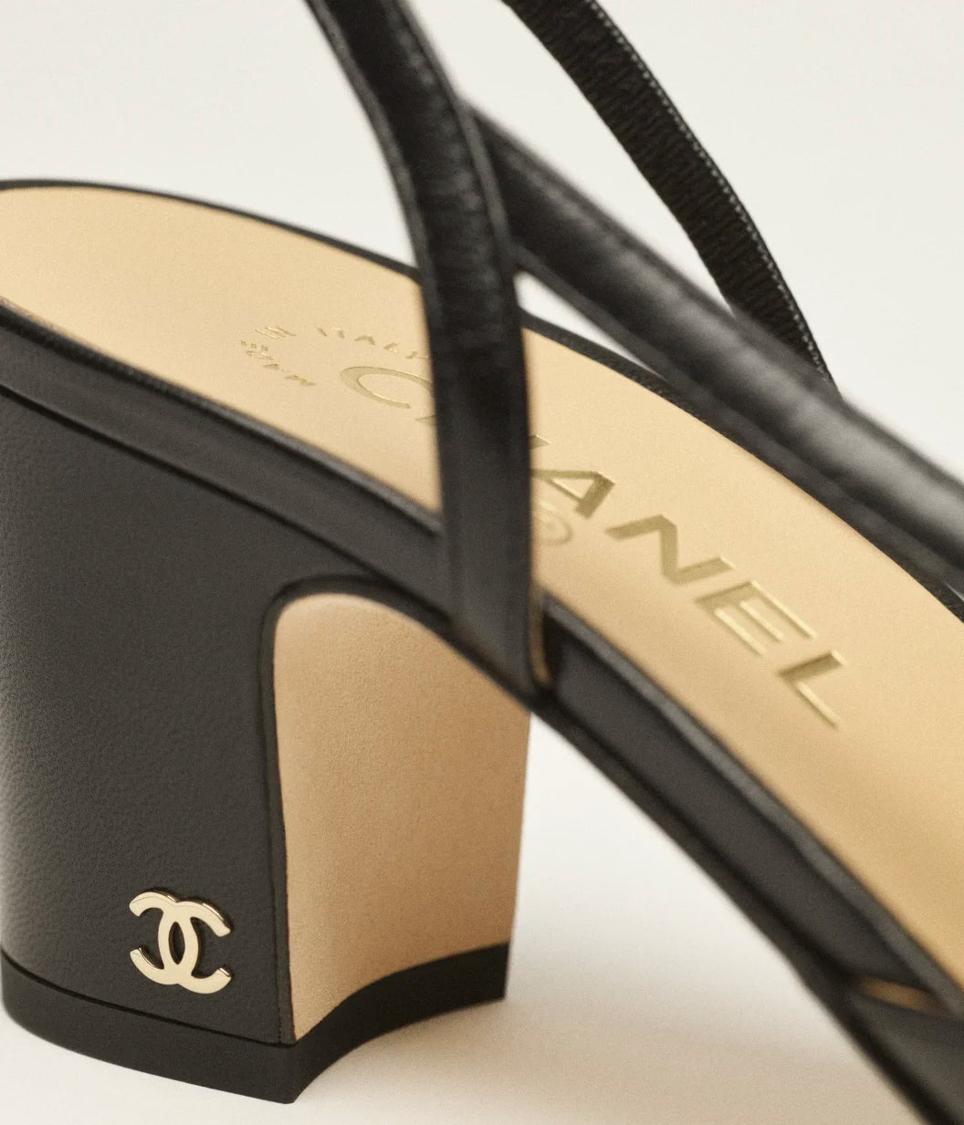 Black slingback heels in goatskin and grosgrain with CC logo — Chanel | Endless UAE