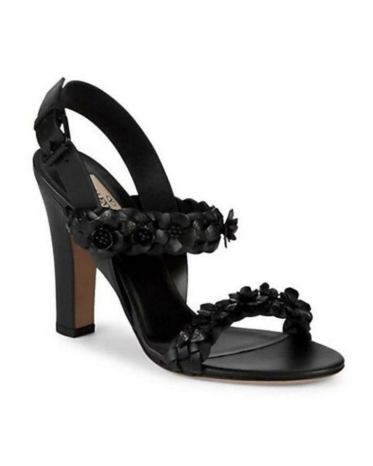Black leather heeled sandals with 3D floral embellishments and ankle strap — Valentino Garavani | Endless UAE