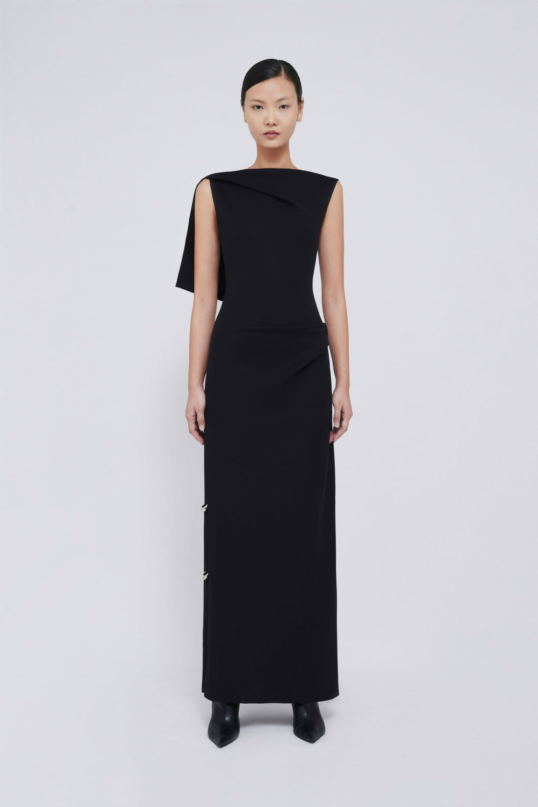 Black sleeveless maxi dress with draped shoulder detail and side buttons — Chats By C.Dam | Endless UAE
