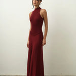 Burgundy ribbed sleeveless maxi dress with high neckline and flowing skirt — Nora the Label | Endless UAE