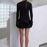 Black ribbed mini dress with ruffled skirt hem and long sleeves — L'IDÉE | Endless UAE
