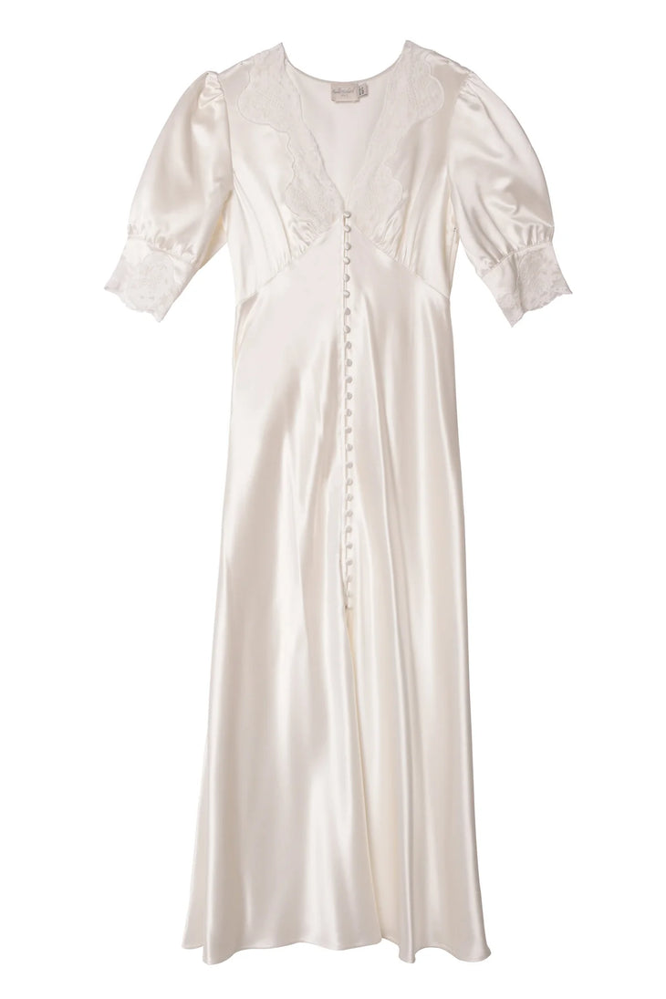Ivory white satin midi dress with puff sleeves, embroidered lace trim, and button-front detail — Rixo | Endless UAE