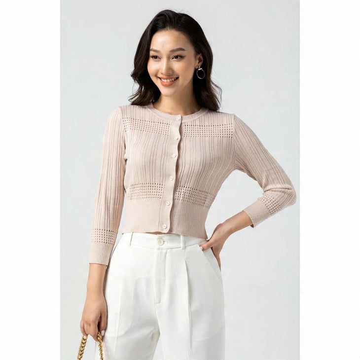 Cream ribbed cardigan with textured panels and button closure — Sandro | Endless UAE