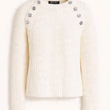 Cream ribbed knit sweater with silver-tone button details on shoulders — Maje | Endless UAE
