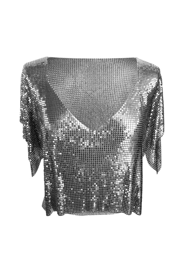 Gunmetal Ava Top worn by woman at beach with rocky cliff backdrop — Isabel Moore | Endless UAE