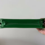 Dulce Patent Leather Shoulder Bag in vibrant green, held up against neutral background — By Far | Endless UAE