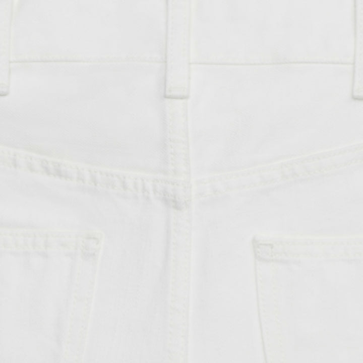 Folded white denim jeans with visible back pocket detail — Celine | Endless UAE