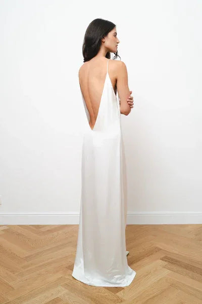 Elegant white backless maxi dress with draped cowl back and flowing silhouette — Amara Grace | Endless UAE