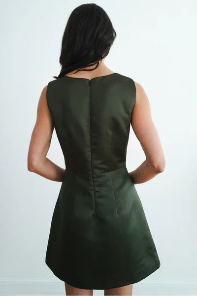 Back view of sleeveless dark green mini dress with fitted bodice and A-line skirt — Amara Grace | Endless UAE
