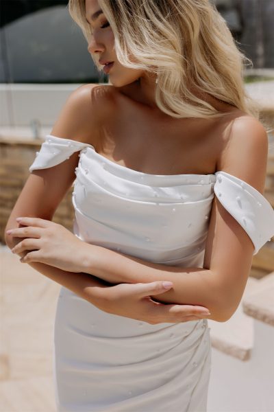 Elegant white off-shoulder wedding gown with draped details and train — Miss Chloe | Endless UAE