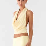 Pale yellow halter crop top and maxi skirt co-ord set — Peppermayo | Endless UAE