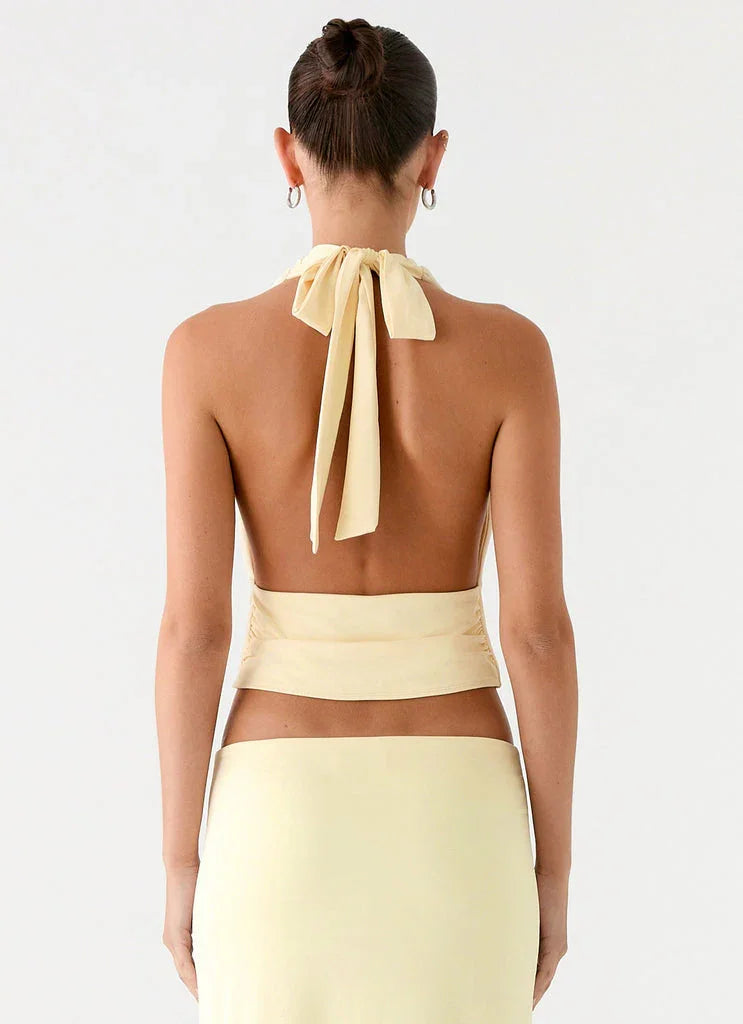 Pale yellow halter crop top and maxi skirt co-ord set — Peppermayo | Endless UAE