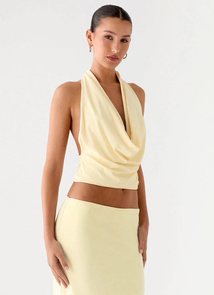 Pale yellow halter crop top and maxi skirt co-ord set — Peppermayo | Endless UAE