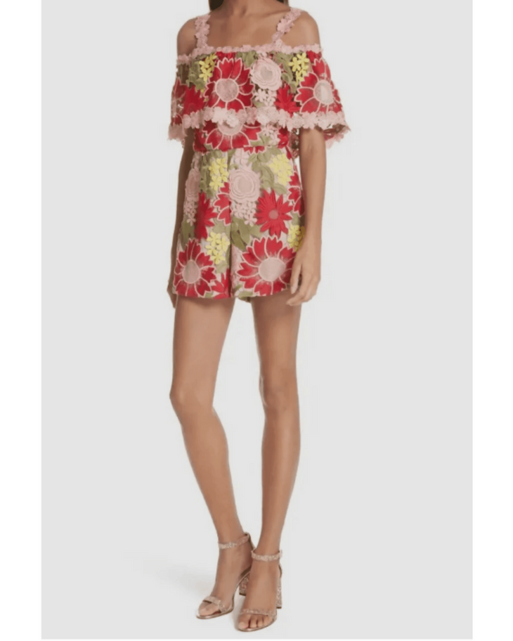 Floral guipure lace playsuit with off-shoulder ruffled sleeves in red, pink and green — Alice + Olivia | Endless UAE