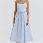 Woman wearing light blue sleeveless midi dress with corset top and full skirt — Endless | Endless UAE