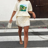 Shell Mini Wrap Skirt