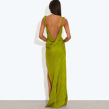 Lime green floor-length dress with open draped back, crossed straps, and side slit, modeled from behind — Rat and Boa | Endless UAE