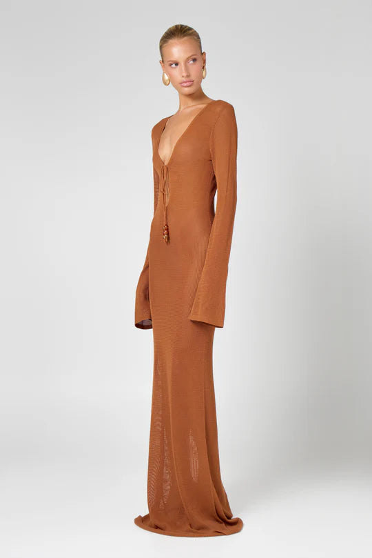 Brown long sleeve plunge neck knit maxi dress with drawstring front detail on model — Hyphen | Endless UAE