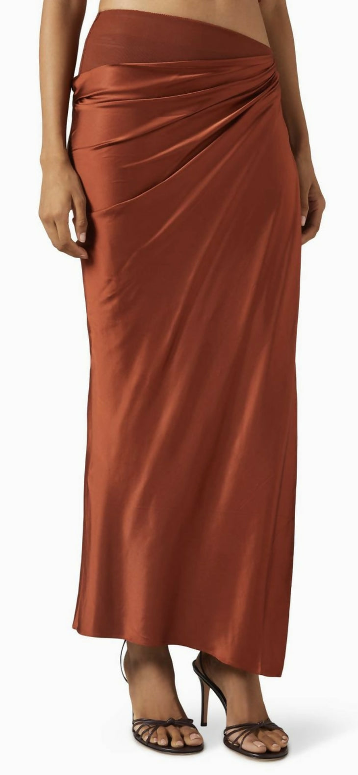 Rust brown satin maxi skirt with asymmetric draped waistband detail and side slit — Significant Other | Endless UAE