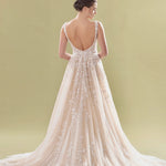 Elegant A-line bridal gown with lace appliqué, low scoop back, and flowing cathedral train — Teresa Atelier | Endless UAE