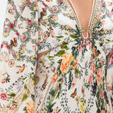Cream floral cut-out maxi dress with long sleeves and tie front detail — Camilla | Endless UAE
