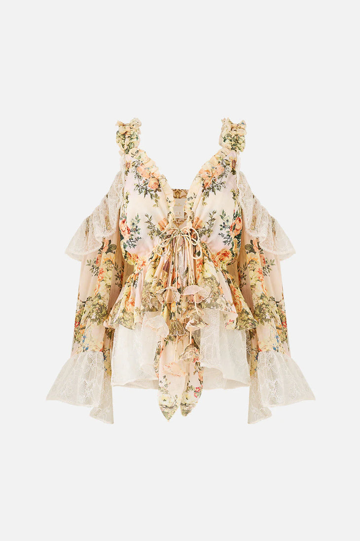 Floral ruffle cold-shoulder blouse with cream high-waisted scalloped shorts — Camilla | Endless UAE