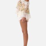 Floral ruffle cold-shoulder blouse with cream high-waisted scalloped shorts — Camilla | Endless UAE