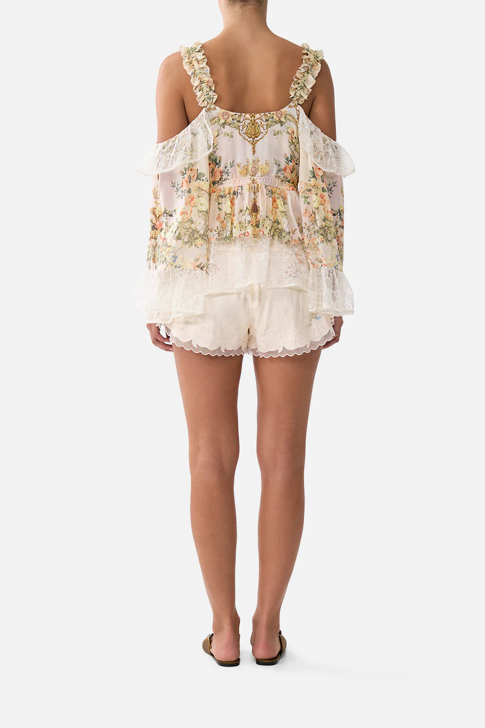 Floral ruffle cold-shoulder blouse with cream high-waisted scalloped shorts — Camilla | Endless UAE