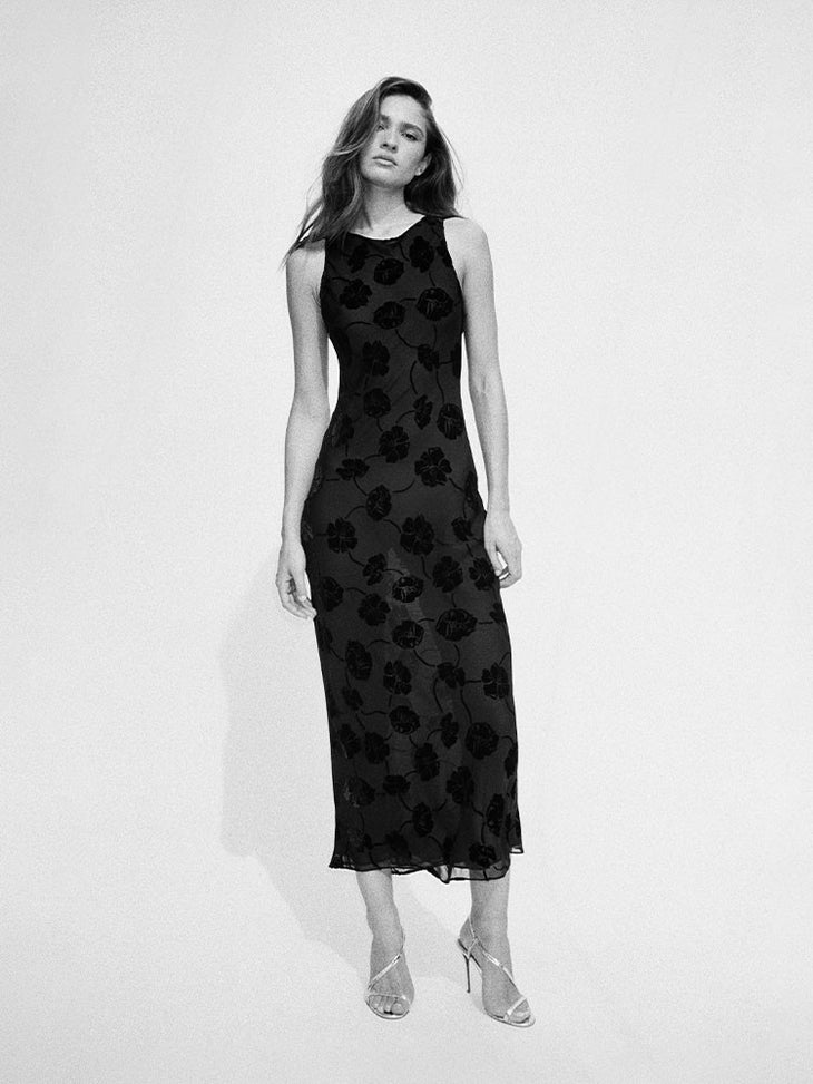 Black floral jacquard sleeveless maxi dress with side cutouts — Realisation Par | Endless UAE