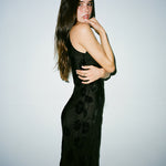 Black floral jacquard sleeveless maxi dress with side cutouts — Realisation Par | Endless UAE