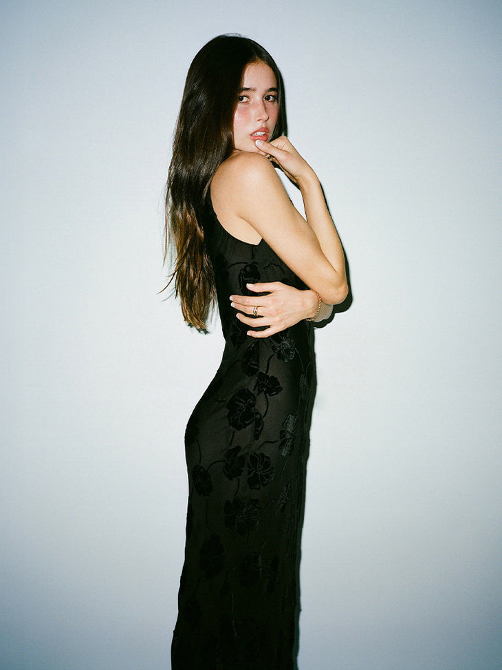 Black floral jacquard sleeveless maxi dress with side cutouts — Realisation Par | Endless UAE