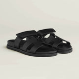 Black leather sandals with wide straps and adjustable ankle strap on chunky sole — Hermes | Endless UAE