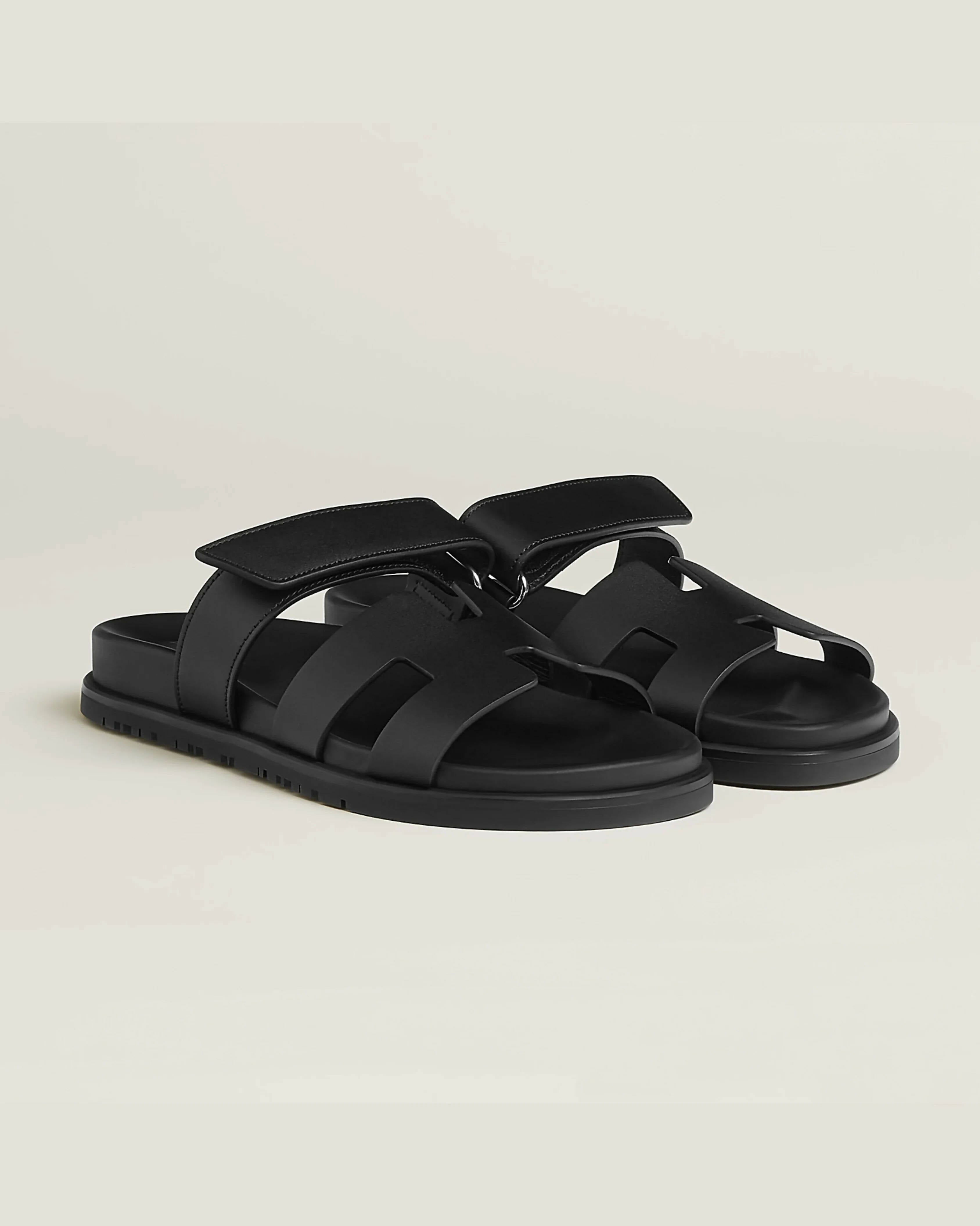 Black leather sandals with wide straps and adjustable ankle strap on chunky sole — Hermes | Endless UAE